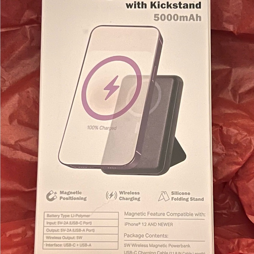 Pink magnetic power bank with silicon kick stand. 500 mah